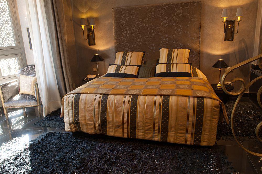 Tigmiza Boutique Hotel & Spa Ouled Jelal Ngoại thất bức ảnh A bedroom at the hotel